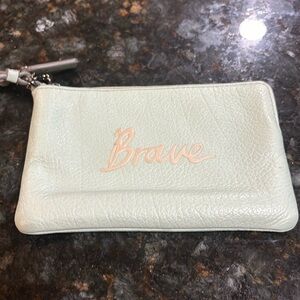 Authentic light blue Coach leather wristlet